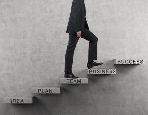 Businessman going up.