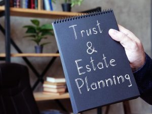 Trust and Estate Planning is shown on black pad