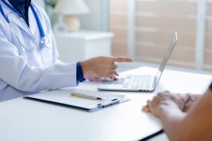 Healthcare attorney giving advise to the patient