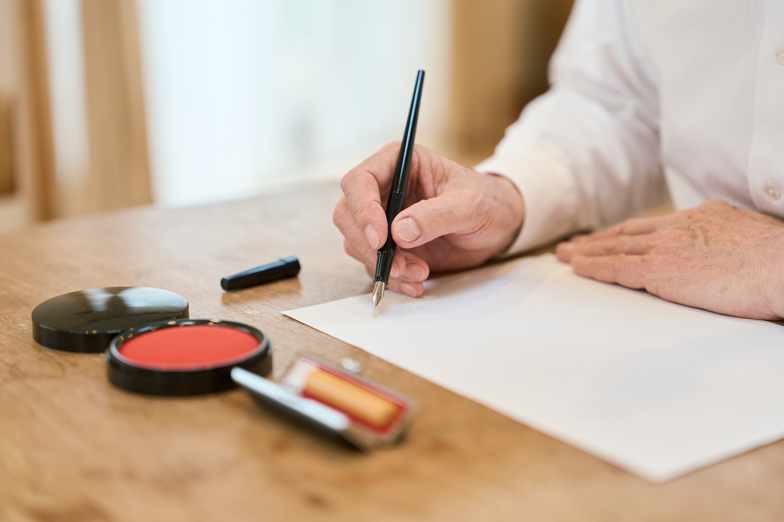 Drafting estate planning documents with Miami FL living will attorneys.